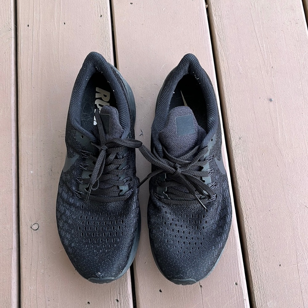 Black Nike running shoes